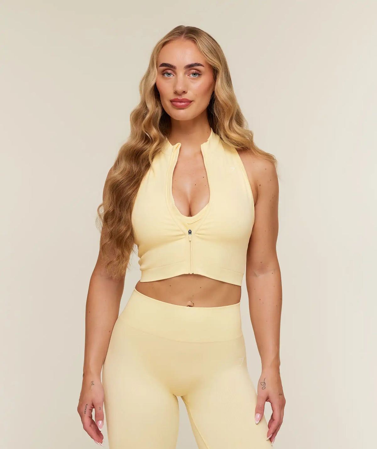 Adapt Solid Zip Front Top